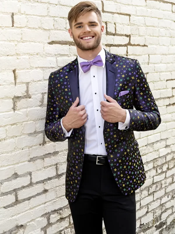 Young man in MOD multicolor jacket and lavender bowtie